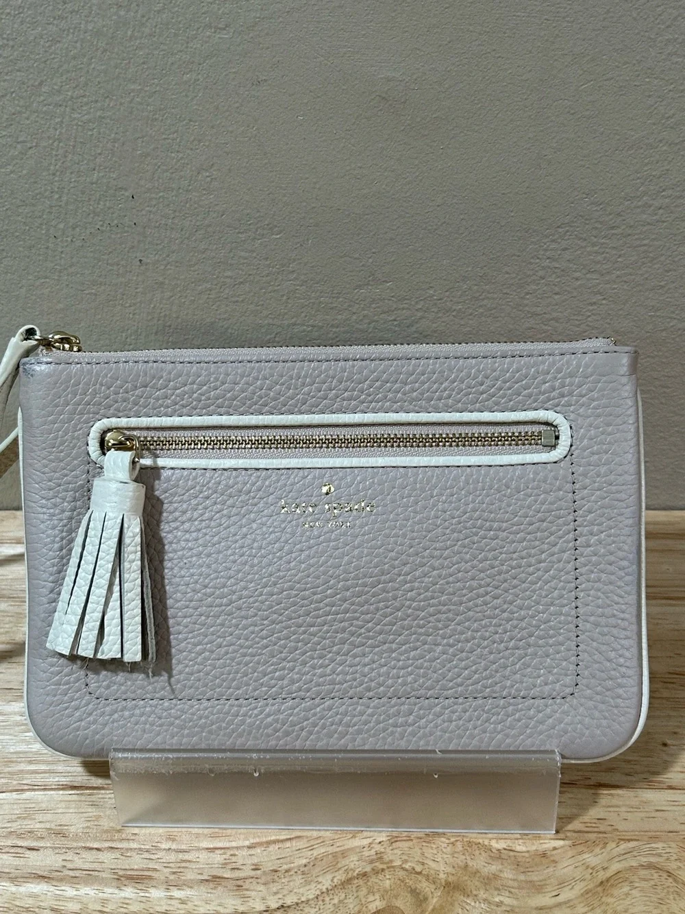 kate spade pebbled leather wristlet in light taupe with beige trim